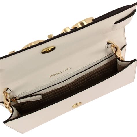 clutch michael kors silber|michael kors women's white clutch.